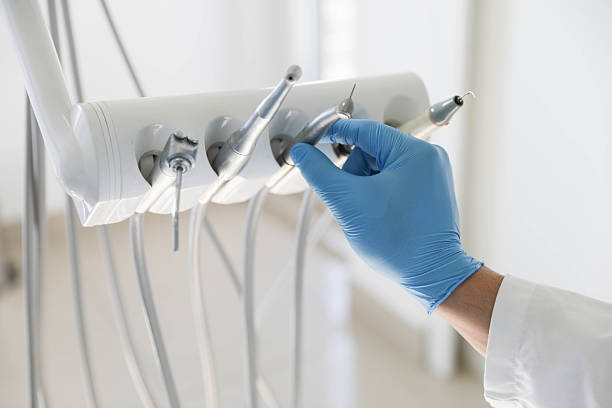 Professional Emergency Dentist technician working in Adrian, MO